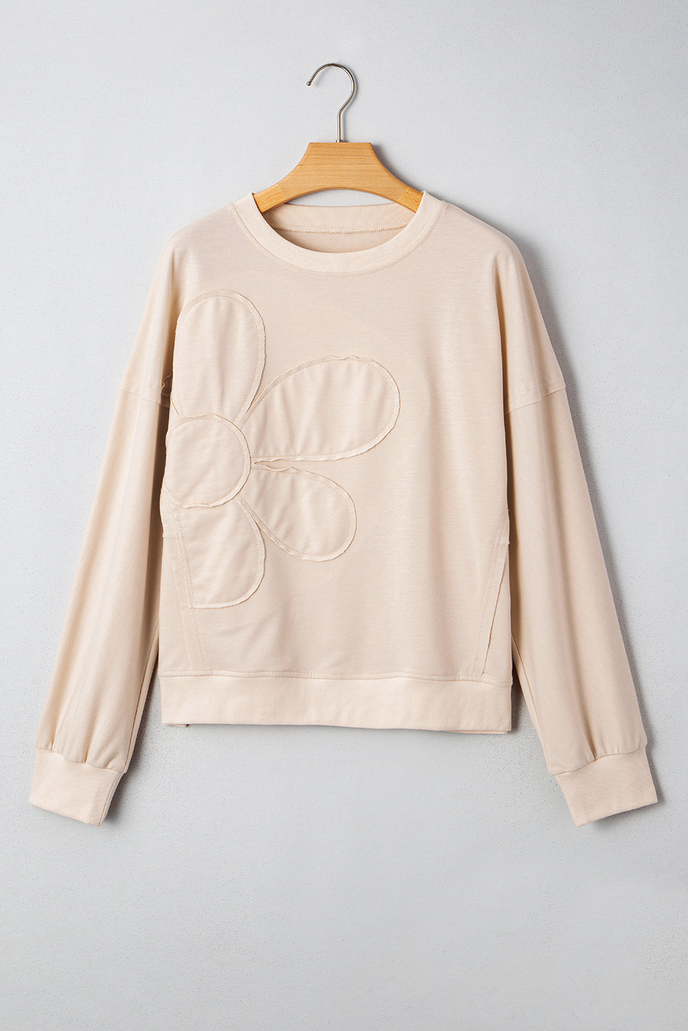 PREORDER: Beige Raw Edge Flower Patch Drop Shoulder Casual Top (Ships 3-4 Weeks)