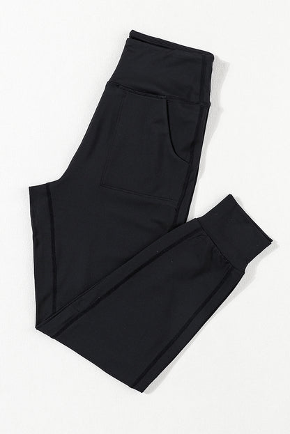 PREORDER: Black Exposed Seam High Waist Pocketed Joggers (Ships 3-4 Weeks)
