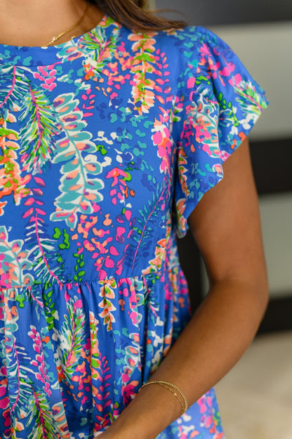 Flirt Alert Flutter Sleeve Top in Blue