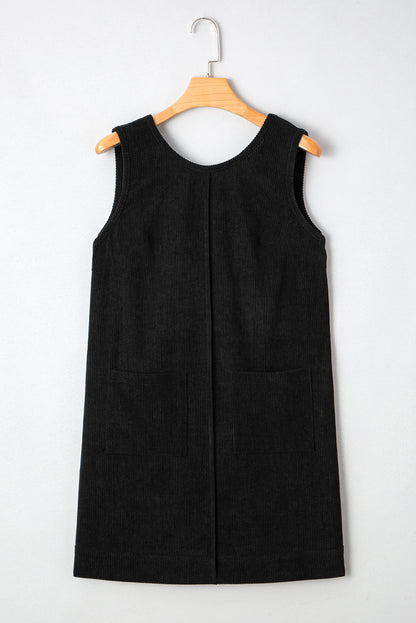 PREORDER: Black Corduroy Sleeveless Mini Dress With Patched Pockets (Ships 3-4 Weeks)